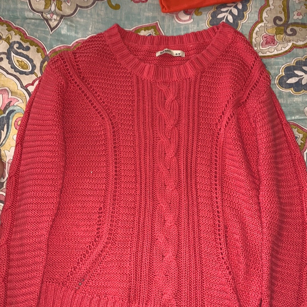 Pink knitted sweater